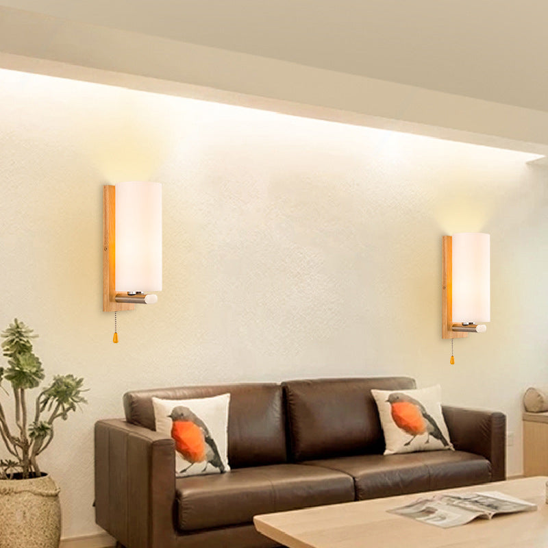 Cylindrical Bedside Wall Mounted Light White Glass Single Simplicity Wall Sconce Lighting with Pull Chain Clearhalo 'Modern wall lights' 'Modern' 'Wall Lamps & Sconces' 'Wall Lights' Lighting' 2218124