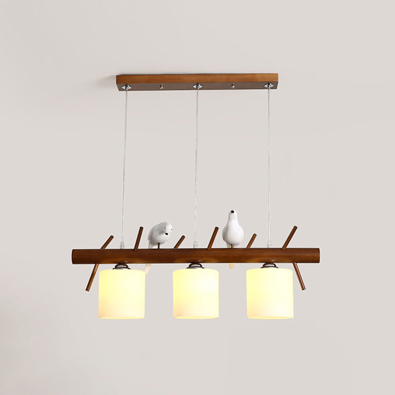 Cylinder Restaurant LED Pendant Light White Glass Simplicity Hanging Island Light with Resin Bird Clearhalo 'Ceiling Lights' 'Island Lights' Lighting' 2218236