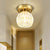 Dome Flush Mount Light Modernism Dimpled Crystal 1 Light Brass Ceiling Light Fixture for Corridor Brass Clearhalo 'Ceiling Lights' 'Close To Ceiling Lights' 'Close to ceiling' 'Flush mount' 'Industrial Flush Mount' Lighting' 221956