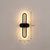 Contemporary Oblong LED Wall Lighting Acrylic Living Room Sconce Light Fixture in Black Black Small Warm Clearhalo 'Modern wall lights' 'Modern' 'Wall Lamps & Sconces' 'Wall Lights' Lighting' 2228322