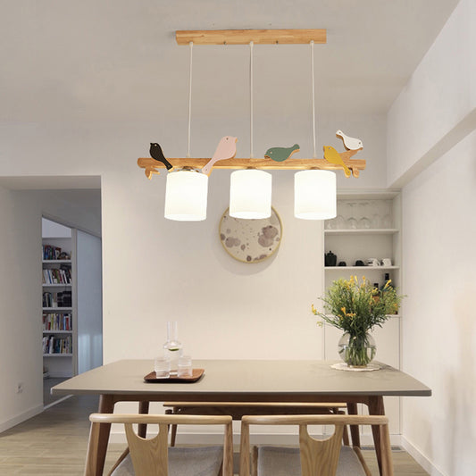 Cylindrical LED Hanging Lamp Simplicity Cream Glass Dining Room Island Chandelier Light with Wooden Bird 3 Wood Clearhalo 'Ceiling Lights' 'Island Lights' Lighting' 2228554