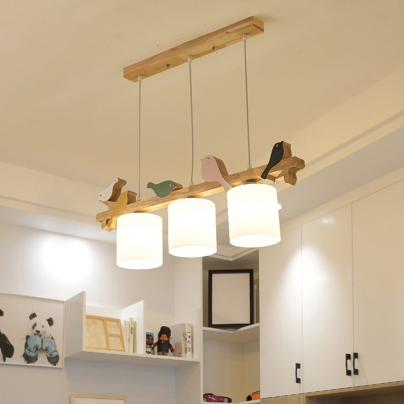 Cylindrical LED Hanging Lamp Simplicity Cream Glass Dining Room Island Chandelier Light with Wooden Bird Clearhalo 'Ceiling Lights' 'Island Lights' Lighting' 2228556
