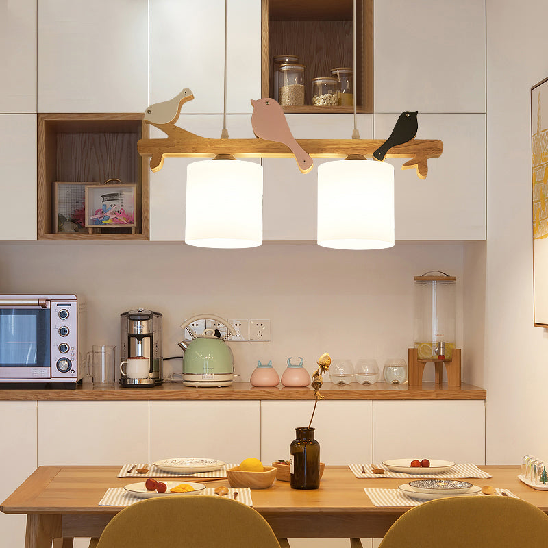 Cylindrical LED Hanging Lamp Simplicity Cream Glass Dining Room Island Chandelier Light with Wooden Bird Clearhalo 'Ceiling Lights' 'Island Lights' Lighting' 2228557