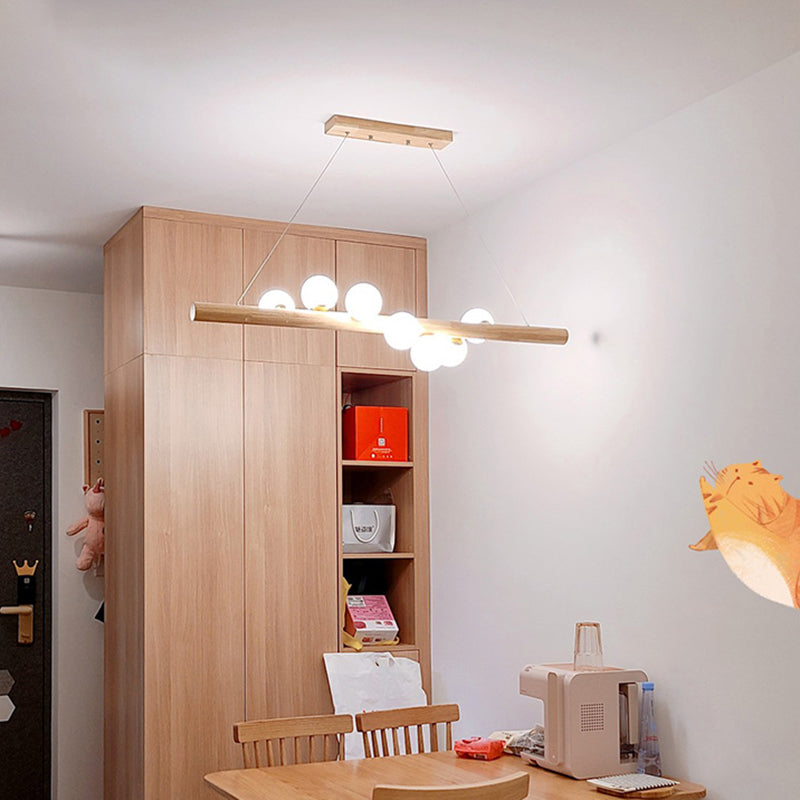 Ball Island Pendant Light Minimalist Cream Glass Restaurant LED Ceiling Light in Wood Clearhalo 'Ceiling Lights' 'Island Lights' Lighting' 2228581