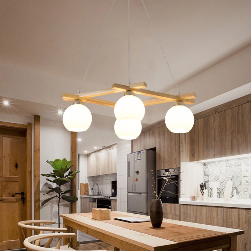 Sphere Living Room Chandelier Pendant Light Cream Glass 4 Bulbs Japanese Hanging Light in Wood Clearhalo 'Carpenter Chandeliers' 'Ceiling Lights' 'Chandeliers' 'Industrial' 'Modern Chandeliers' 'Modern' Lighting' 2228939