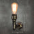 Iron Water Pipe Wall Lamp Rustic Style 1 Bulb Restaurant Wall Light Fixture in Bronze Bronze Clearhalo 'Art deco wall lights' 'Cast Iron' 'Glass' 'Industrial wall lights' 'Industrial' 'Middle century wall lights' 'Modern' 'Rustic wall lights' 'Tiffany' 'Traditional wall lights' 'Wall Lamps & Sconces' 'Wall Lights' Lighting' 2235548