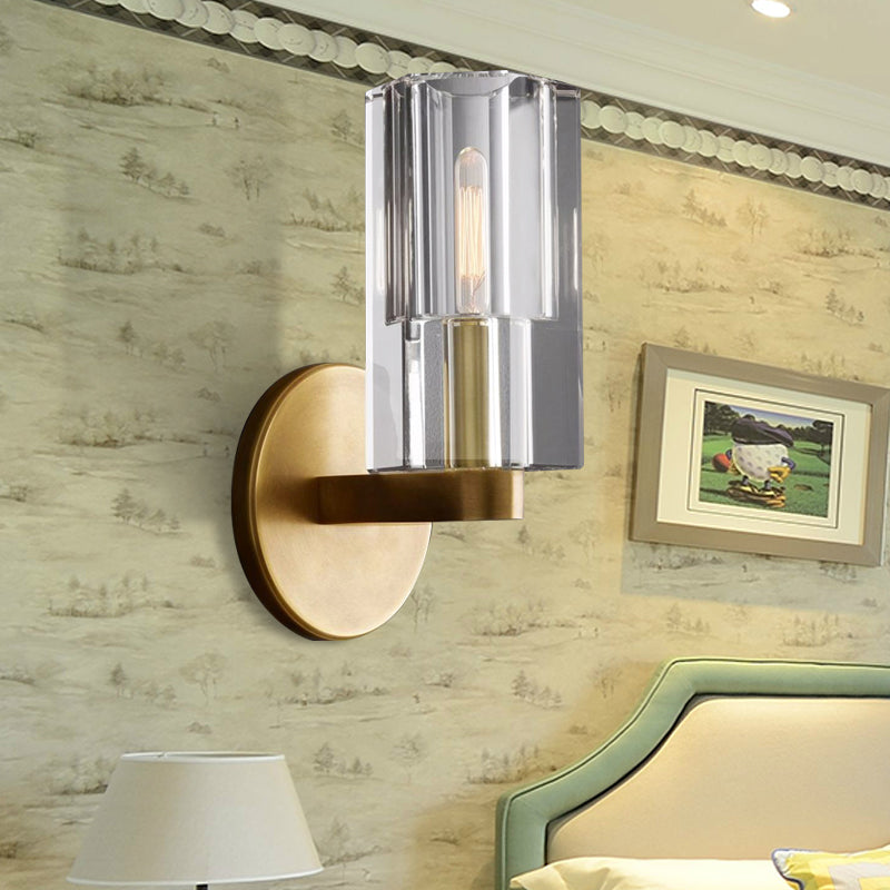 Cylinder Clear Crystal Wall Lamp Modernist 1 Light Wall Lighting Fixture with Round Backplate in Brass Brass Clearhalo 'Modern wall lights' 'Modern' 'Wall Lamps & Sconces' 'Wall Lights' Lighting' 224437