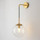 Glass Spherical Wall Sconce Light Simple Single Bulb Wall Hanging Lighting for Living Room Clearhalo 'Cast Iron' 'Glass' 'Industrial' 'Modern wall lights' 'Modern' 'Tiffany' 'Traditional wall lights' 'Wall Lamps & Sconces' 'Wall Lights' Lighting' 2254336
