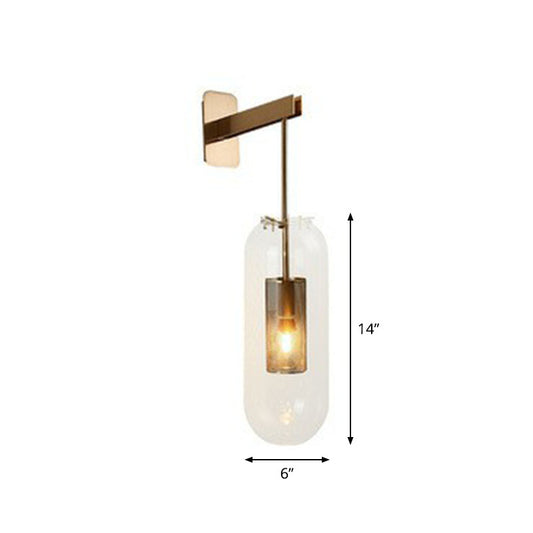Transparent Glass Capsule Sconce Lighting Simple 1-Light Wall Mount Light with Wire Mesh Guard Inside Gold Clearhalo 'Cast Iron' 'Glass' 'Industrial' 'Modern wall lights' 'Modern' 'Tiffany' 'Traditional wall lights' 'Wall Lamps & Sconces' 'Wall Lights' Lighting' 2254381