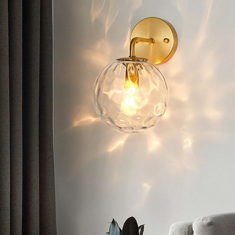 Minimalist Single-Bulb Wall Light Fixture Gold Ball Sconce with Hammered Glass Shade Clearhalo 'Cast Iron' 'Glass' 'Industrial' 'Modern wall lights' 'Modern' 'Tiffany' 'Traditional wall lights' 'Wall Lamps & Sconces' 'Wall Lights' Lighting' 2254401