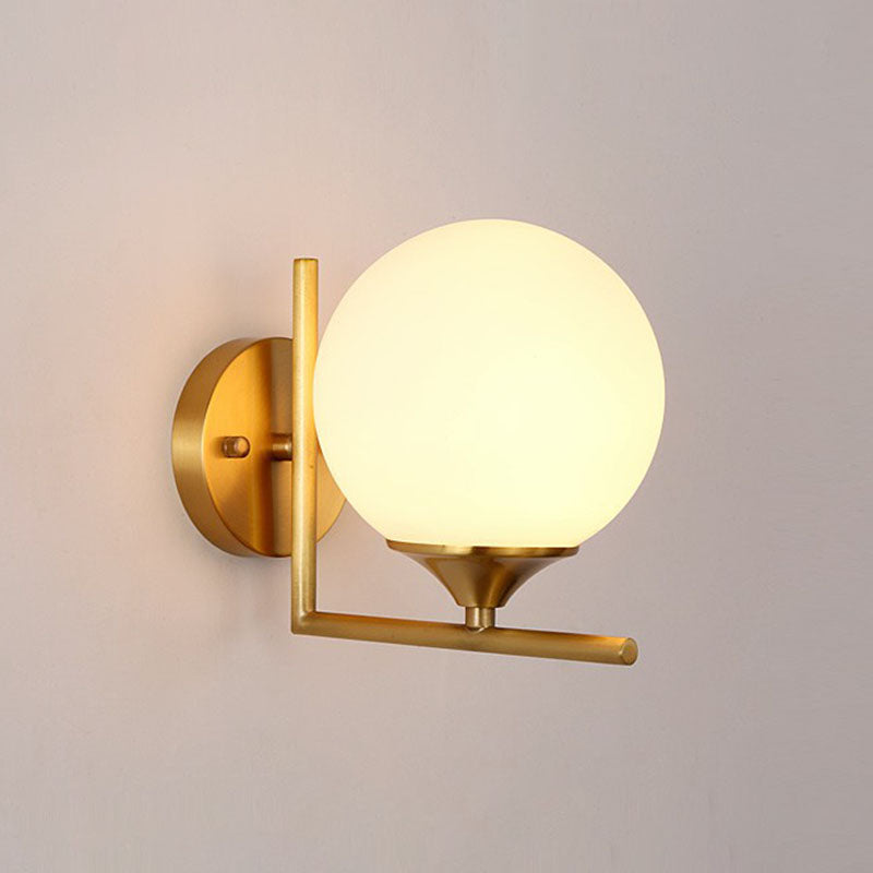 Sphere Bedside Wall Sconce Milk Glass 1-Light Minimalist Wall Mounted Light with Right Angle Arm in Gold Gold 6" Clearhalo 'Cast Iron' 'Glass' 'Industrial' 'Modern wall lights' 'Modern' 'Tiffany' 'Traditional wall lights' 'Wall Lamps & Sconces' 'Wall Lights' Lighting' 2254519
