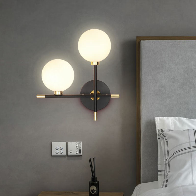 Ball Bedside Sconce Fixture Opaline Glass Contemporary Wall Mounted Light in Black Clearhalo 'Cast Iron' 'Glass' 'Industrial' 'Modern wall lights' 'Modern' 'Tiffany' 'Traditional wall lights' 'Wall Lamps & Sconces' 'Wall Lights' Lighting' 2254593