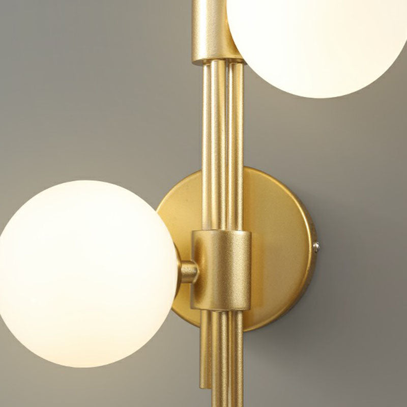 Designer Ball Wall Light Sconce Glass 3-Head Bedroom Wall Mounted Lighting in Brass Clearhalo 'Cast Iron' 'Glass' 'Industrial' 'Modern wall lights' 'Modern' 'Tiffany' 'Traditional wall lights' 'Wall Lamps & Sconces' 'Wall Lights' Lighting' 2254633