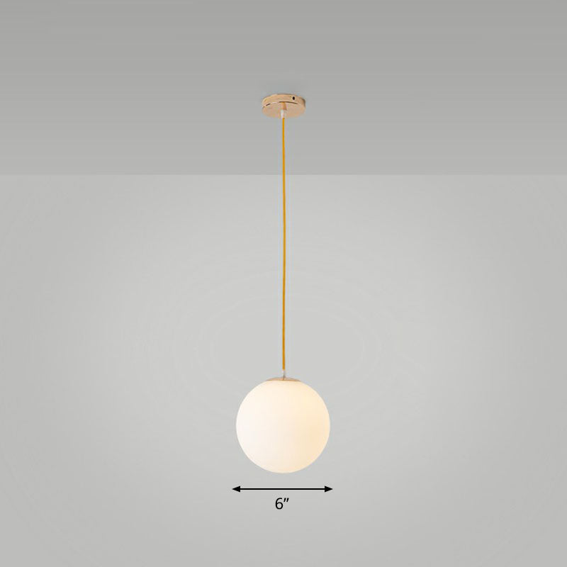 White Glass Spherical Suspension Lighting Minimalism 1 Head Ceiling Pendant Light over Table White 6" Clearhalo 'Ceiling Lights' 'Modern Pendants' 'Modern' 'Pendant Lights' 'Pendants' Lighting' 2254671