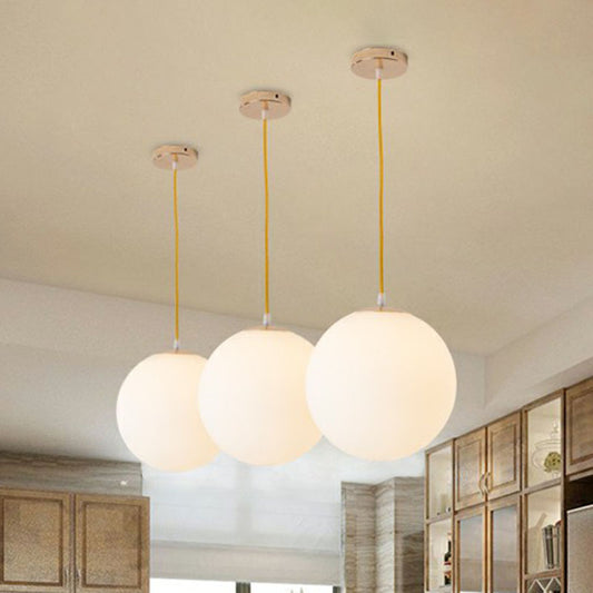 White Glass Spherical Suspension Lighting Minimalism 1 Head Ceiling Pendant Light over Table Clearhalo 'Ceiling Lights' 'Modern Pendants' 'Modern' 'Pendant Lights' 'Pendants' Lighting' 2254675