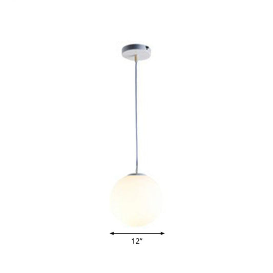 Opaque Glass Spherical Hanging Lamp Modern 1 Head White Pendant Lighting for Dining Room White 12" Clearhalo 'Ceiling Lights' 'Modern Pendants' 'Modern' 'Pendant Lights' 'Pendants' Lighting' 2254711