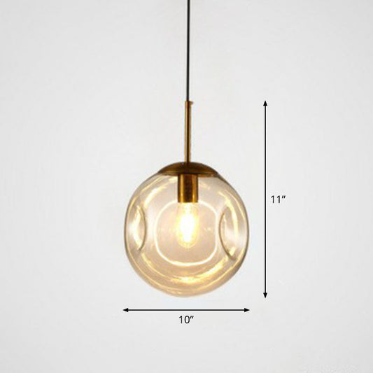 Dimpled Ball Suspension Lighting Modern Glass 1 Bulb Dining Room Ceiling Pendant Lamp Amber Clearhalo 'Ceiling Lights' 'Modern Pendants' 'Modern' 'Pendant Lights' 'Pendants' Lighting' 2254770