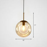 Dimpled Ball Suspension Lighting Modern Glass 1 Bulb Dining Room Ceiling Pendant Lamp Amber Clearhalo 'Ceiling Lights' 'Modern Pendants' 'Modern' 'Pendant Lights' 'Pendants' Lighting' 2254770