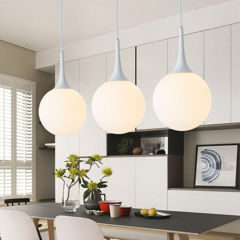 Spherical Cream Glass Suspension Light Minimalist 1-Light Hanging Pendant for Dining Room White Clearhalo 'Ceiling Lights' 'Modern Pendants' 'Modern' 'Pendant Lights' 'Pendants' Lighting' 2254812