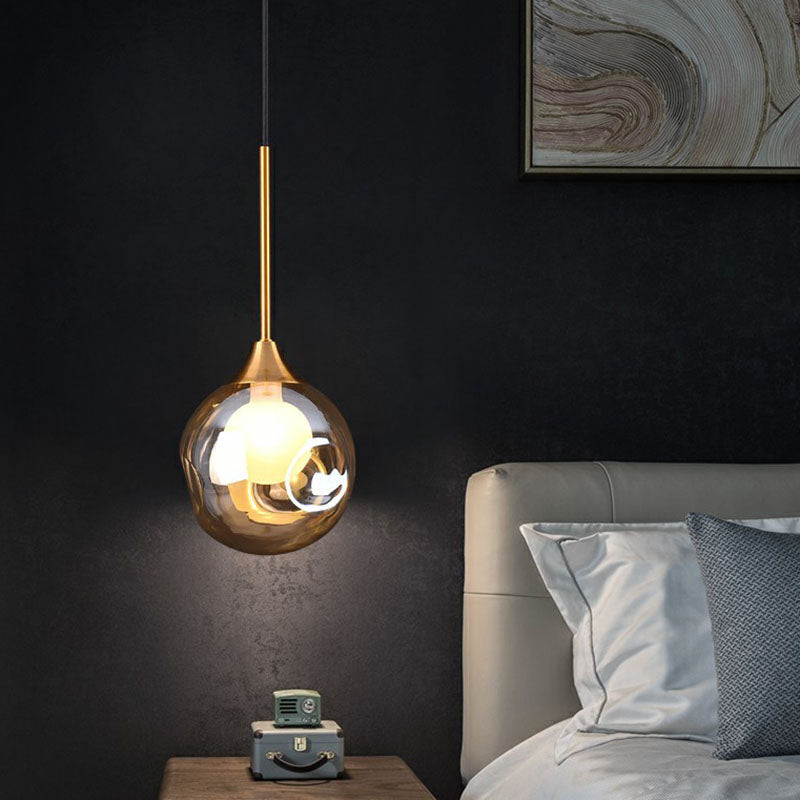 1 Head Bedside Pendant Light Postmodern Brass Ceiling Lamp with Ball Dimple Glass Shade Clearhalo 'Ceiling Lights' 'Modern Pendants' 'Modern' 'Pendant Lights' 'Pendants' Lighting' 2254818