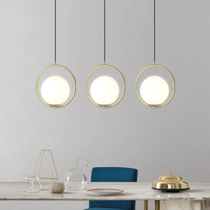 Globe Bedside Pendulum Light Cream Glass 1-Head Postmodern Ceiling Pendant with Ring in Gold Clearhalo 'Ceiling Lights' 'Modern Pendants' 'Modern' 'Pendant Lights' 'Pendants' Lighting' 2254873