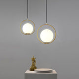Globe Bedside Pendulum Light Cream Glass 1-Head Postmodern Ceiling Pendant with Ring in Gold Clearhalo 'Ceiling Lights' 'Modern Pendants' 'Modern' 'Pendant Lights' 'Pendants' Lighting' 2254874