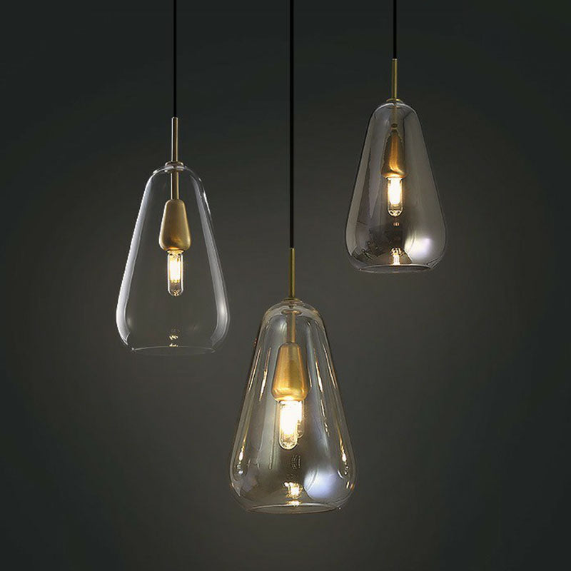 Droplet Open-Kitchen Pendant Light Glass 1 Head Simplicity Pendulum Light in Brass Clearhalo 'Ceiling Lights' 'Modern Pendants' 'Modern' 'Pendant Lights' 'Pendants' Lighting' 2255048
