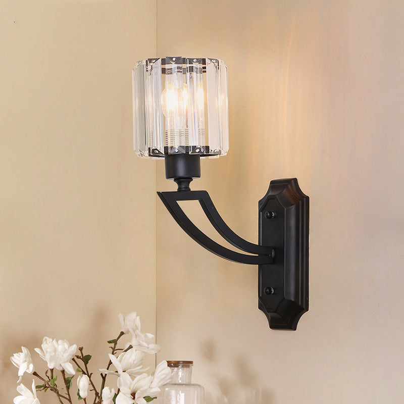 Cylindrical Clear Crystal Wall Light Modernist Style 1 Light Black/Gold Finish Wall Sconce Fixture with Curved Arm Clearhalo 'Cast Iron' 'Glass' 'Industrial' 'Modern wall lights' 'Modern' 'Tiffany' 'Traditional wall lights' 'Wall Lamps & Sconces' 'Wall Lights' Lighting' 225753