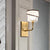 Brass Cylinder Sconce Light Wall Contemporary 1 Light Crystal Wall Mounted Lighting with Curved Arm Brass Clearhalo 'Modern wall lights' 'Modern' 'Wall Lamps & Sconces' 'Wall Lights' Lighting' 226329