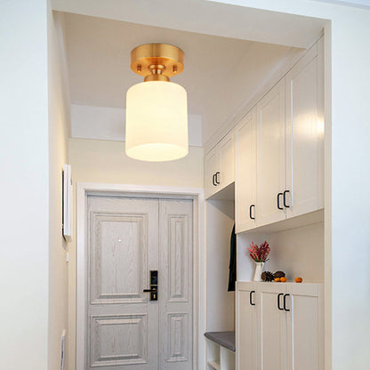 Cylinder White Glass Flush Fixture Traditional 1 Light Living Room Ceiling Light in Gold Gold Clearhalo 'Ceiling Lights' 'Close To Ceiling Lights' 'Close to ceiling' 'Flush mount' Lighting' 226505