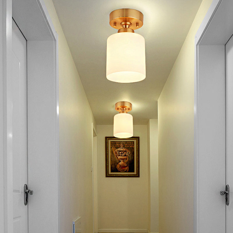 Cylinder White Glass Flush Fixture Traditional 1 Light Living Room Ceiling Light in Gold Clearhalo 'Ceiling Lights' 'Close To Ceiling Lights' 'Close to ceiling' 'Flush mount' Lighting' 226506