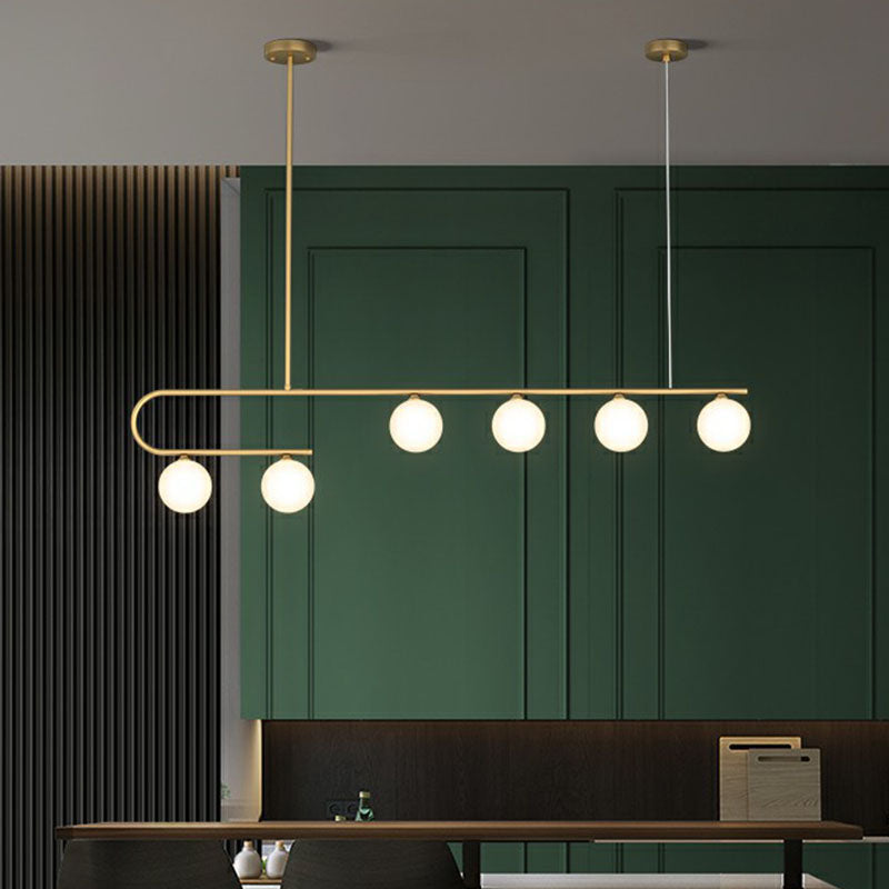 Linear Restaurant Island Pendant Light Ivory Ball Glass Postmodern LED Hanging Lamp in Gold Clearhalo 'Ceiling Lights' 'Island Lights' Lighting' 2265835