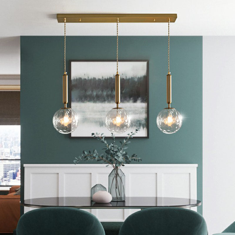 Cluster Ball Pendant Light Simplicity Honeycomb Glass 3-Head Gold Finish Hanging Light Clearhalo 'Ceiling Lights' 'Modern Pendants' 'Modern' 'Pendant Lights' 'Pendants' Lighting' 2266049