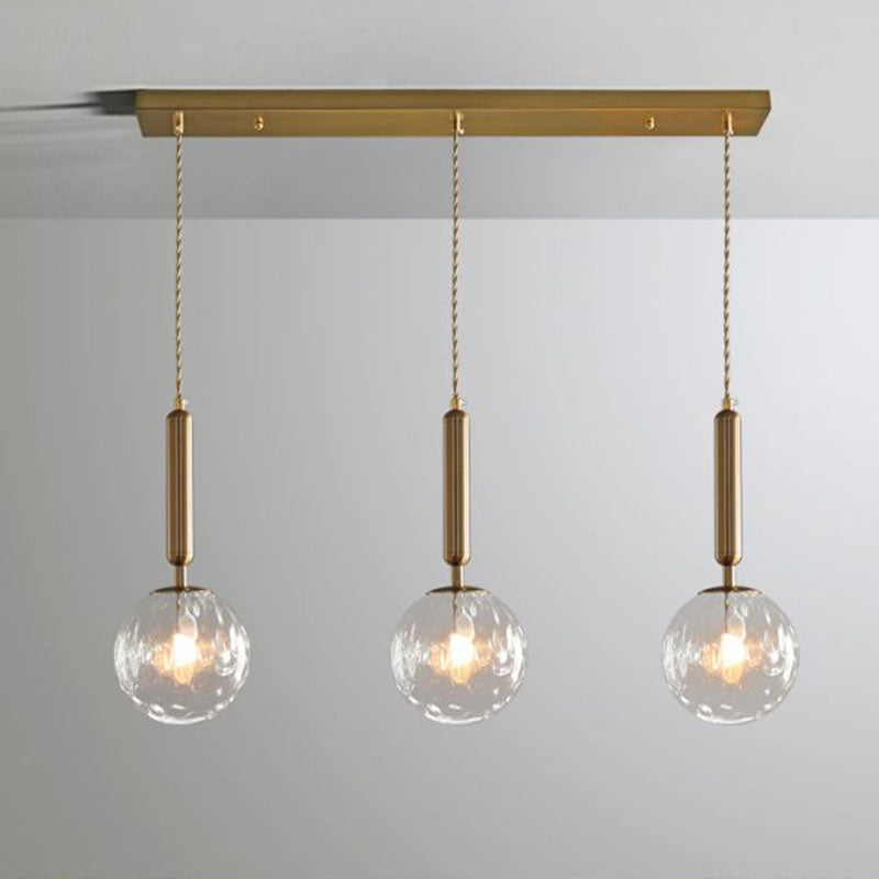 Cluster Ball Pendant Light Simplicity Honeycomb Glass 3-Head Gold Finish Hanging Light Clearhalo 'Ceiling Lights' 'Modern Pendants' 'Modern' 'Pendant Lights' 'Pendants' Lighting' 2266050
