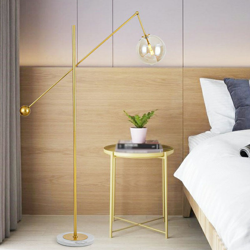 Brass Plated Balance Arm Floor Light Postmodern 1-Light Metal Stand Up Lamp with Spherical Glass Shade Clearhalo 'Floor Lamps' 'Lamps' Lighting' 2266075