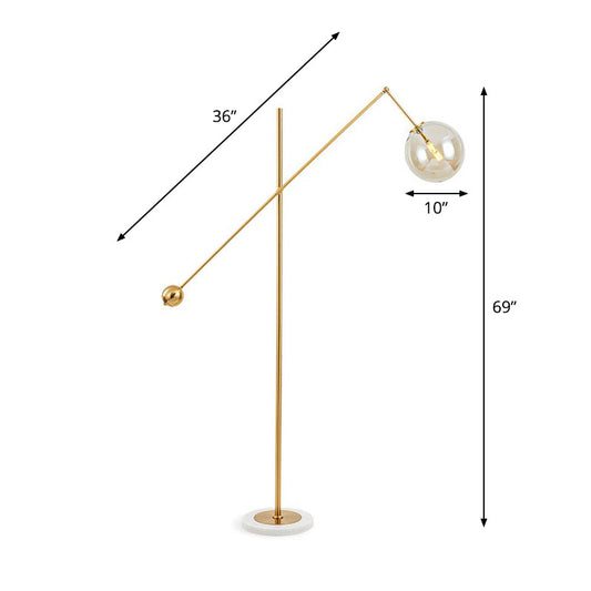 Brass Plated Balance Arm Floor Light Postmodern 1-Light Metal Stand Up Lamp with Spherical Glass Shade Amber Clearhalo 'Floor Lamps' 'Lamps' Lighting' 2266077
