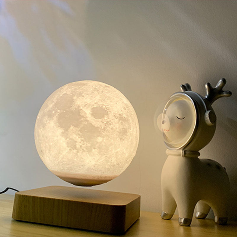 Magnetic Levitation Moon Shaped Night Light Novelty Kids Plastic LED Table Lamp with Square Wooden Base Clearhalo 'Lamps' 'Table Lamps' Lighting' 2266123