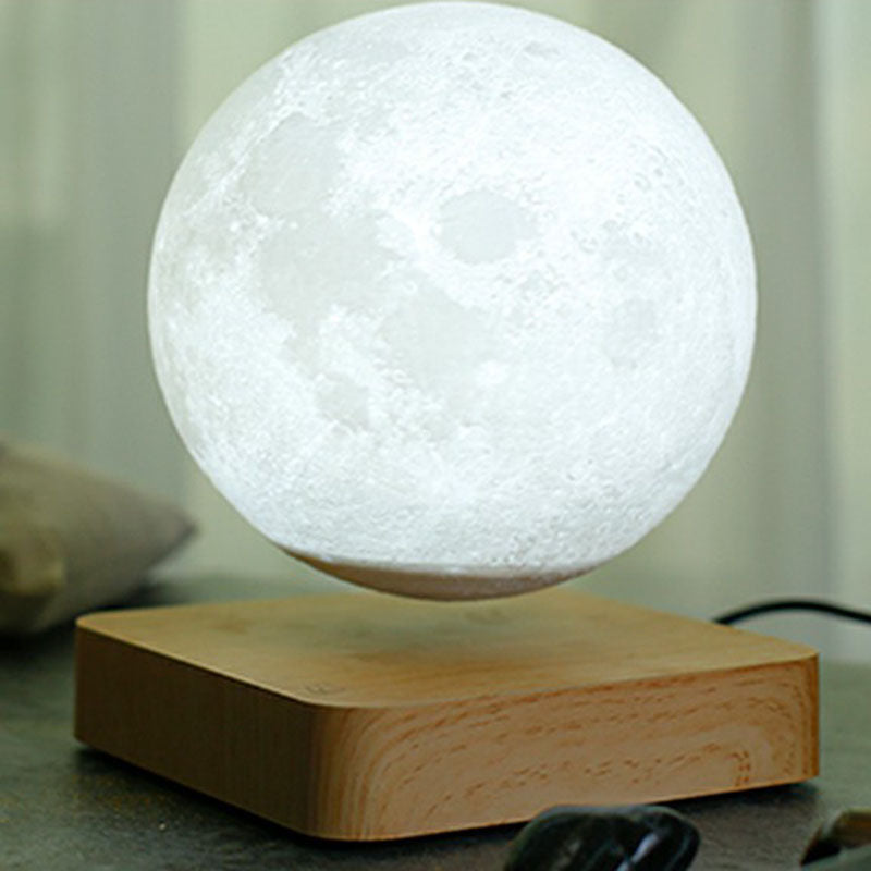 Magnetic Levitation Moon Shaped Night Light Novelty Kids Plastic LED Table Lamp with Square Wooden Base Wood Clearhalo 'Lamps' 'Table Lamps' Lighting' 2266126