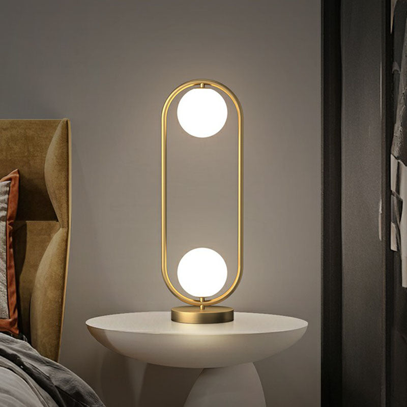 2-Bulb Bedroom Nightstand Lamp Simple Gold Finish Table Light with Ball Cream Glass Shade and Oval Frame Clearhalo 'Lamps' 'Table Lamps' Lighting' 2266182