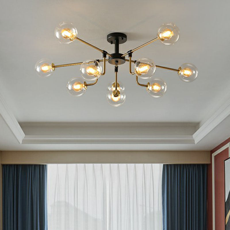 Postmodern 10-Light Chandelier Black and Brass Radial Pendant Light with Ball Glass Shade Clear Clearhalo 'Ceiling Lights' 'Chandeliers' 'Clear' 'Industrial' 'Modern Chandeliers' 'Modern' 'Tiffany' 'Traditional Chandeliers' Lighting' 2266233