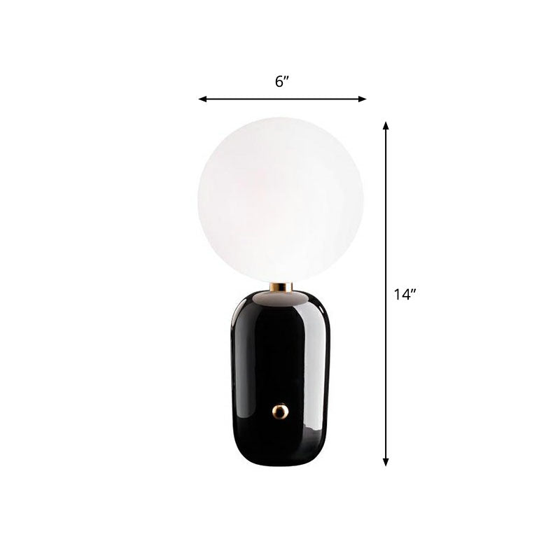 Capsule Base Night Table Light Postmodern Metal 1 Bulb Kids Room Nightstand Lamp with Orb White Glass Shade Black Small Clearhalo 'Lamps' 'Table Lamps' Lighting' 2268643