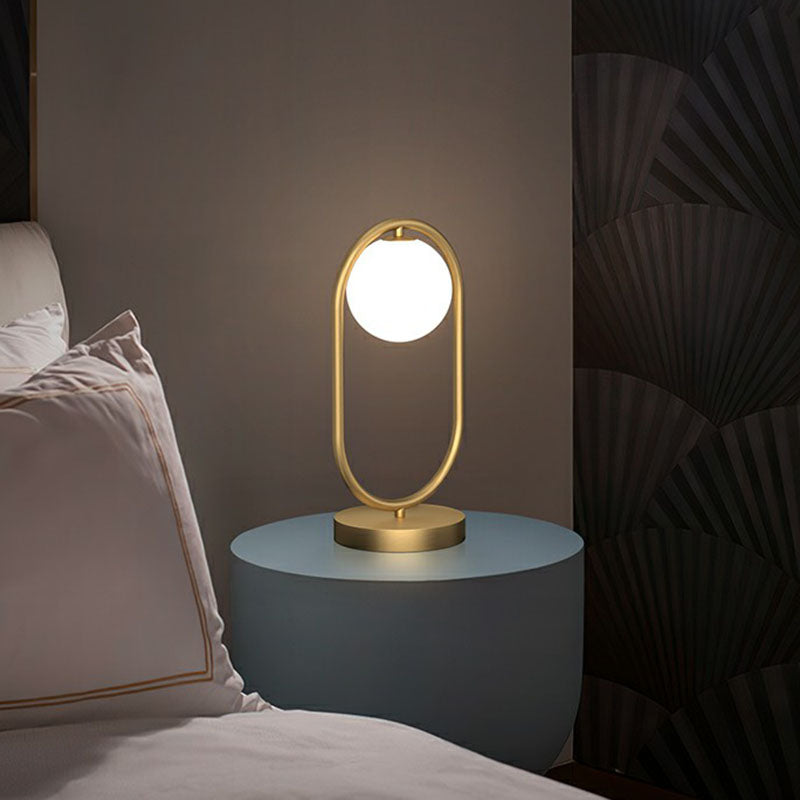 Minimalist Oval Frame Table Lighting Metal 1-Head Bedroom Night Light with Ball Milk Glass Shade in Gold Gold Clearhalo 'Lamps' 'Table Lamps' Lighting' 2268732