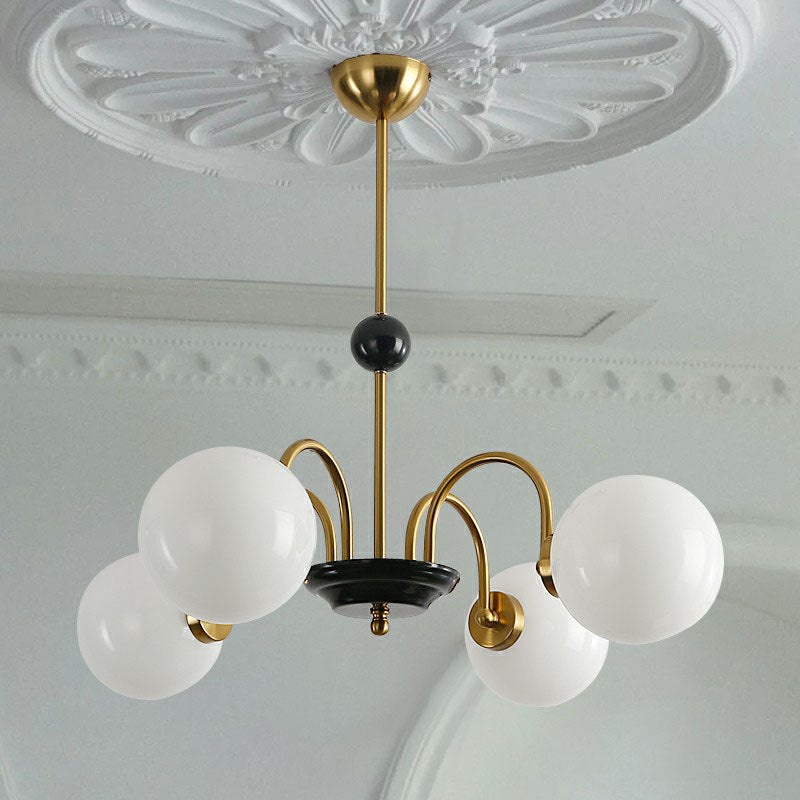 Ivory Glass Ball Chandelier Postmodern Black and Brass Hanging Lighting for Dining Room Clearhalo 'Ceiling Lights' 'Chandeliers' 'Modern Chandeliers' 'Modern' Lighting' 2269097
