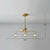 Orb Shaped Hanging Light Postmodern Glass Gold Finish Chandelier for Living Room 5 Clear Clearhalo 'Ceiling Lights' 'Chandeliers' 'Clear' 'Industrial' 'Modern Chandeliers' 'Modern' 'Tiffany' 'Traditional Chandeliers' Lighting' 2269188