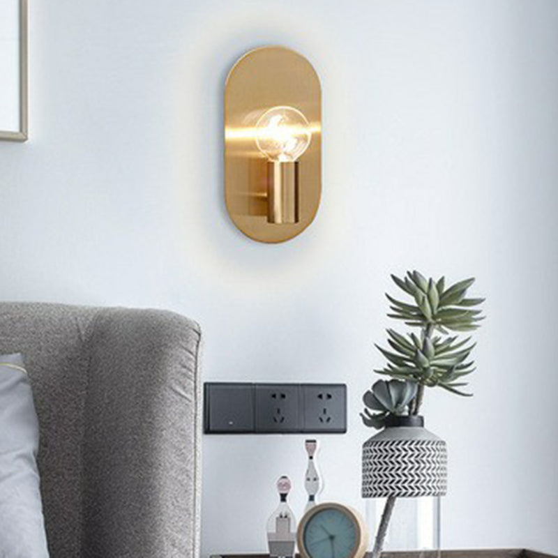 Exposed Bulb Design Sconce Light Postmodern Metal 1-Light Gold Finish Wall Light with Oval Backplate Clearhalo 'Cast Iron' 'Glass' 'Industrial' 'Modern wall lights' 'Modern' 'Tiffany' 'Traditional wall lights' 'Wall Lamps & Sconces' 'Wall Lights' Lighting' 2282975