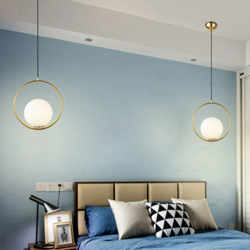 White Glass Spherical Hanging Lamp Post-Modern 1 Head Pendant Light with Metal Ring in Brass Clearhalo 'Ceiling Lights' 'Modern Pendants' 'Modern' 'Pendant Lights' 'Pendants' Lighting' 2283003