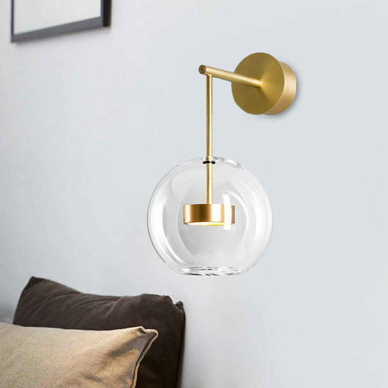 Brass Drum Wall Mounted Lamp Simplicity Metal LED Sconce Light with Globe Clear Glass Shade Brass Clearhalo 'Cast Iron' 'Glass' 'Industrial' 'Modern wall lights' 'Modern' 'Tiffany' 'Traditional wall lights' 'Wall Lamps & Sconces' 'Wall Lights' Lighting' 2283204