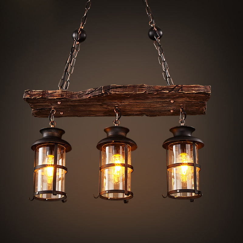 3 Lights Chandelier Nautical Cylinder Clear Glass Hanging Light with Wood Plank Deco in Brown Clearhalo 'Carpenter Chandeliers' 'Ceiling Lights' 'Chandeliers' 'Industrial Chandeliers' 'Industrial' 'Middle Century Chandeliers' 'Modern' 'Tiffany' Lighting' 2289754
