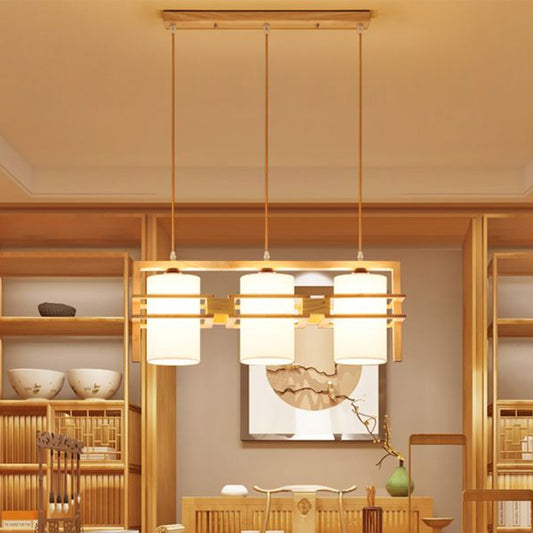 Wooden Linear Island Lighting Modern 3-Bulb Hanging Light with Cylindrical Fabric Shade Clearhalo 'Ceiling Lights' 'Island Lights' Lighting' 2293670