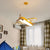 Childrens Plane Shaped Hanging Lamp Acrylic Bedroom LED Chandelier Pendant Light Yellow Clearhalo 'Ceiling Lights' 'Chandeliers' Lighting' options 2311105_4f8e35bb-041e-4ac1-a28c-7c62b44f8e23